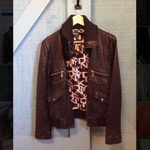 This is a black leather DKNY jacket, size medium.